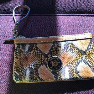 Dooney and Bourke snakeprint wristlet.  Brand new.